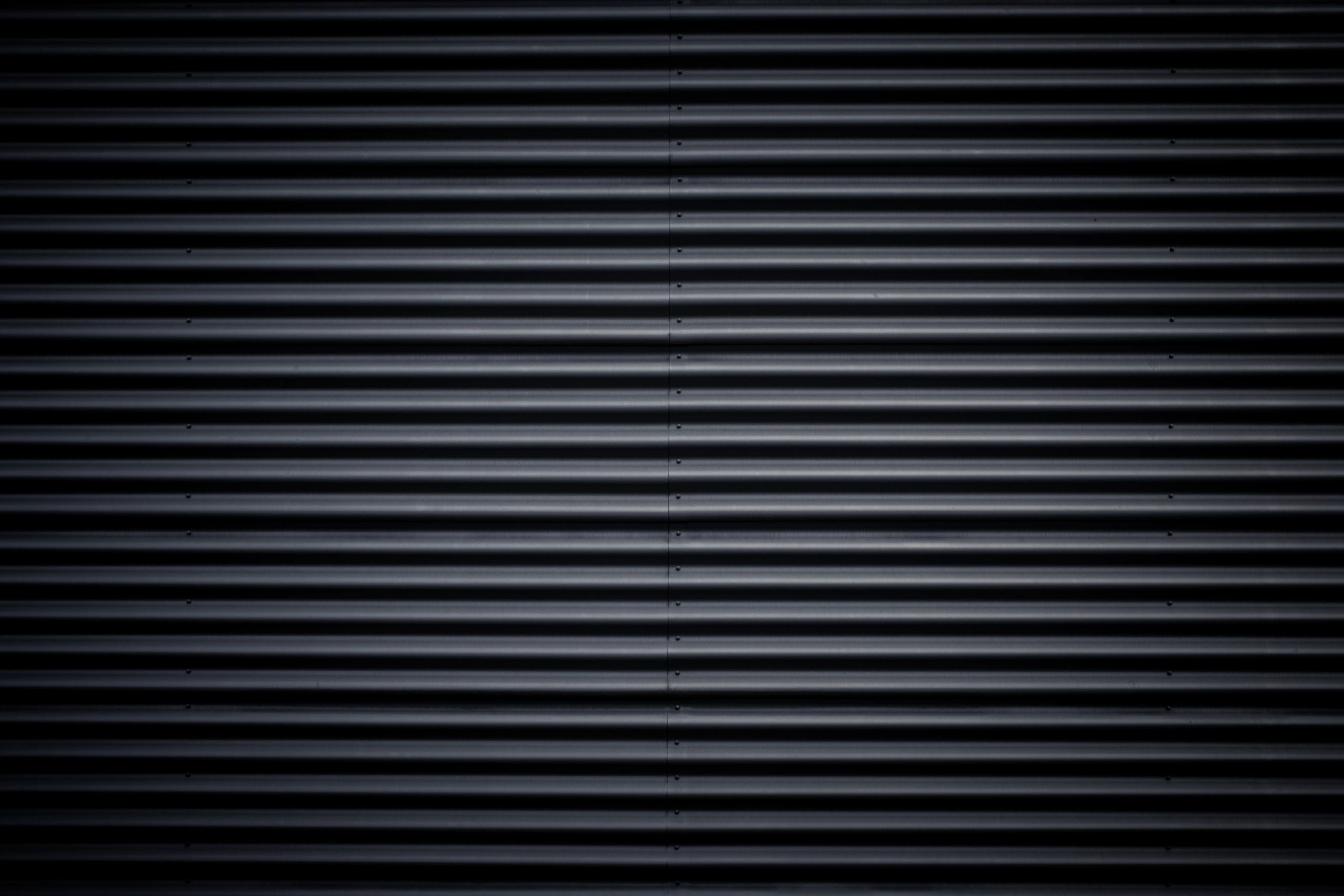 black corrugated metal texture background