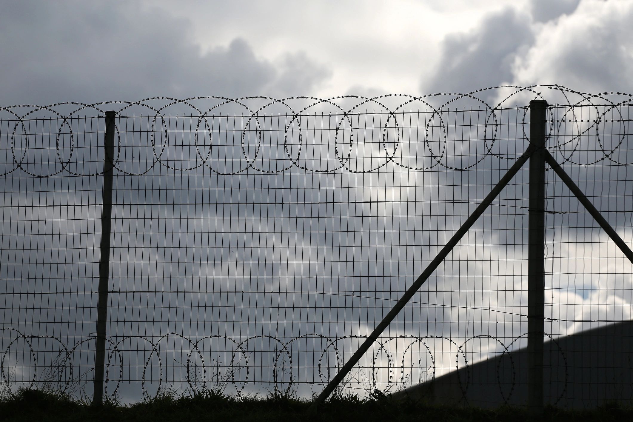 Fence with razor wire