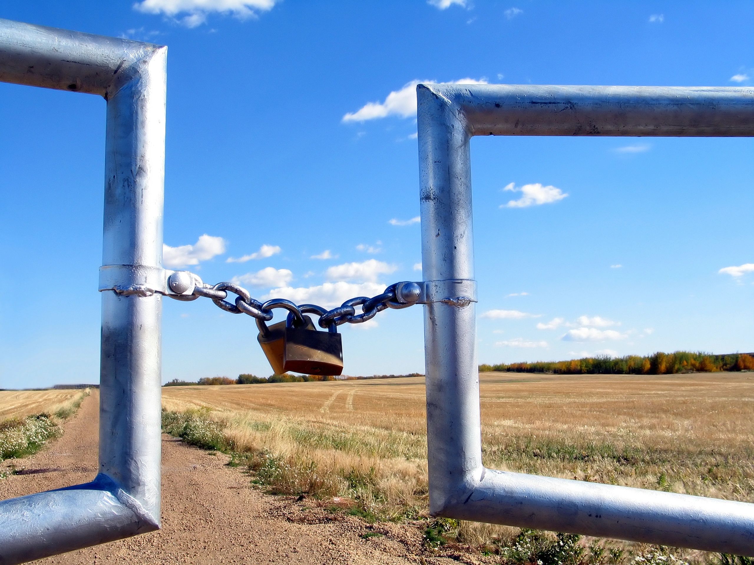 Closed gate at a ranch entrance