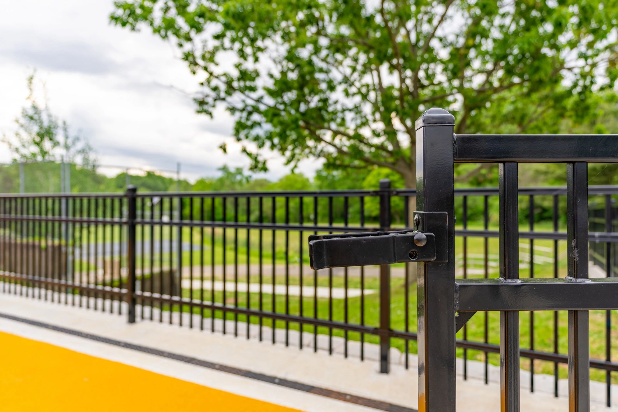 Ornamental fence gate latch detail