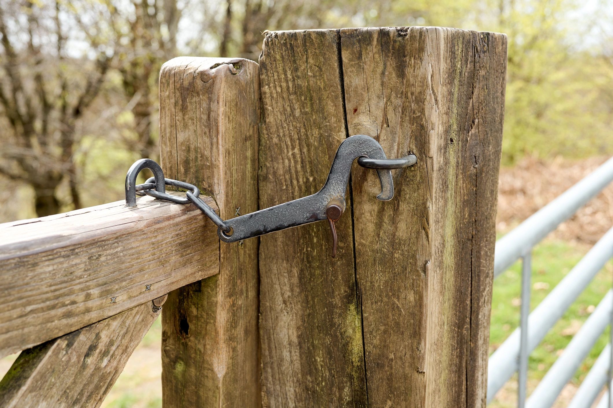 Rustic wooden gate with metal latch
