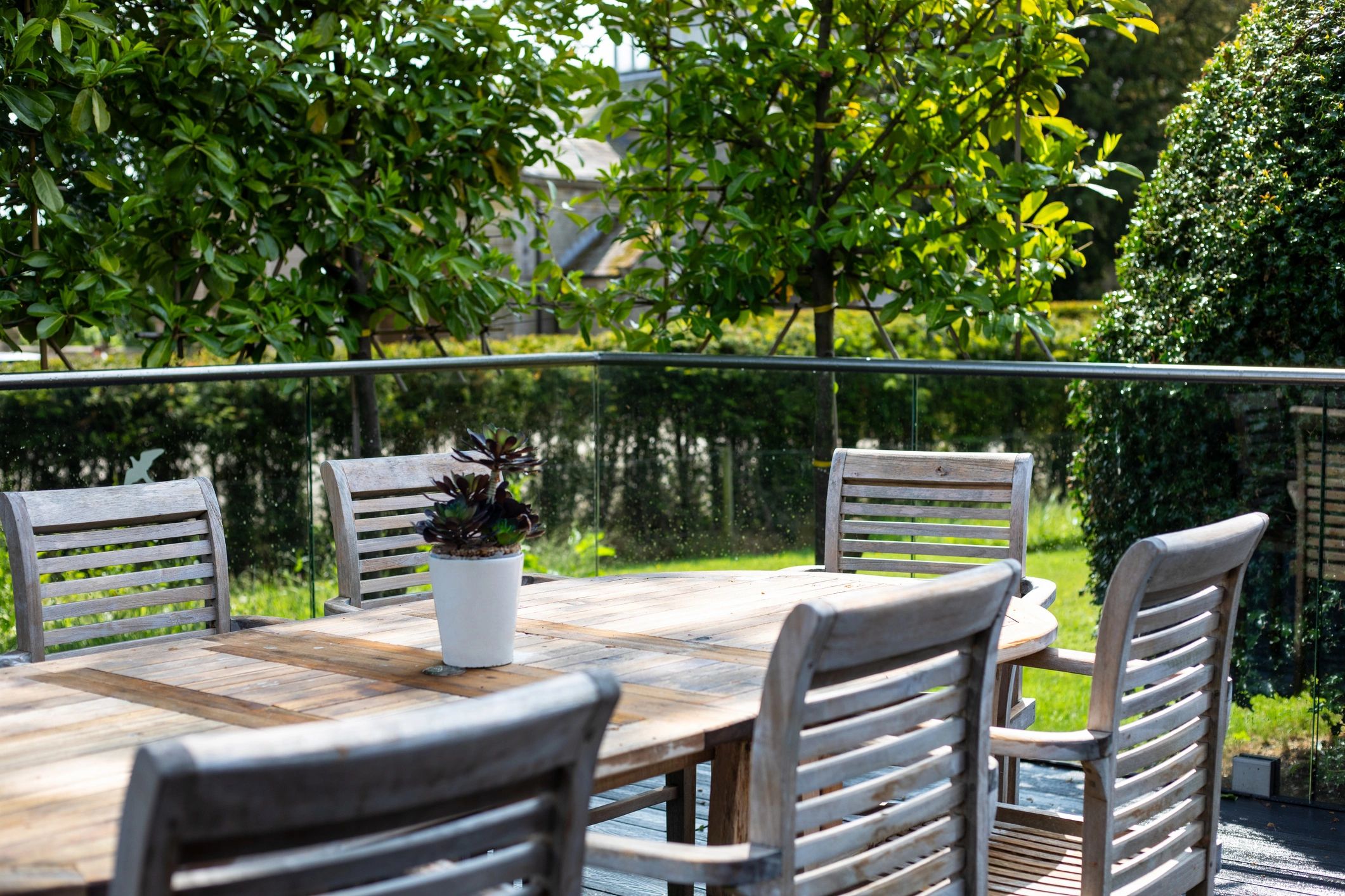 Backyard seating area with fence