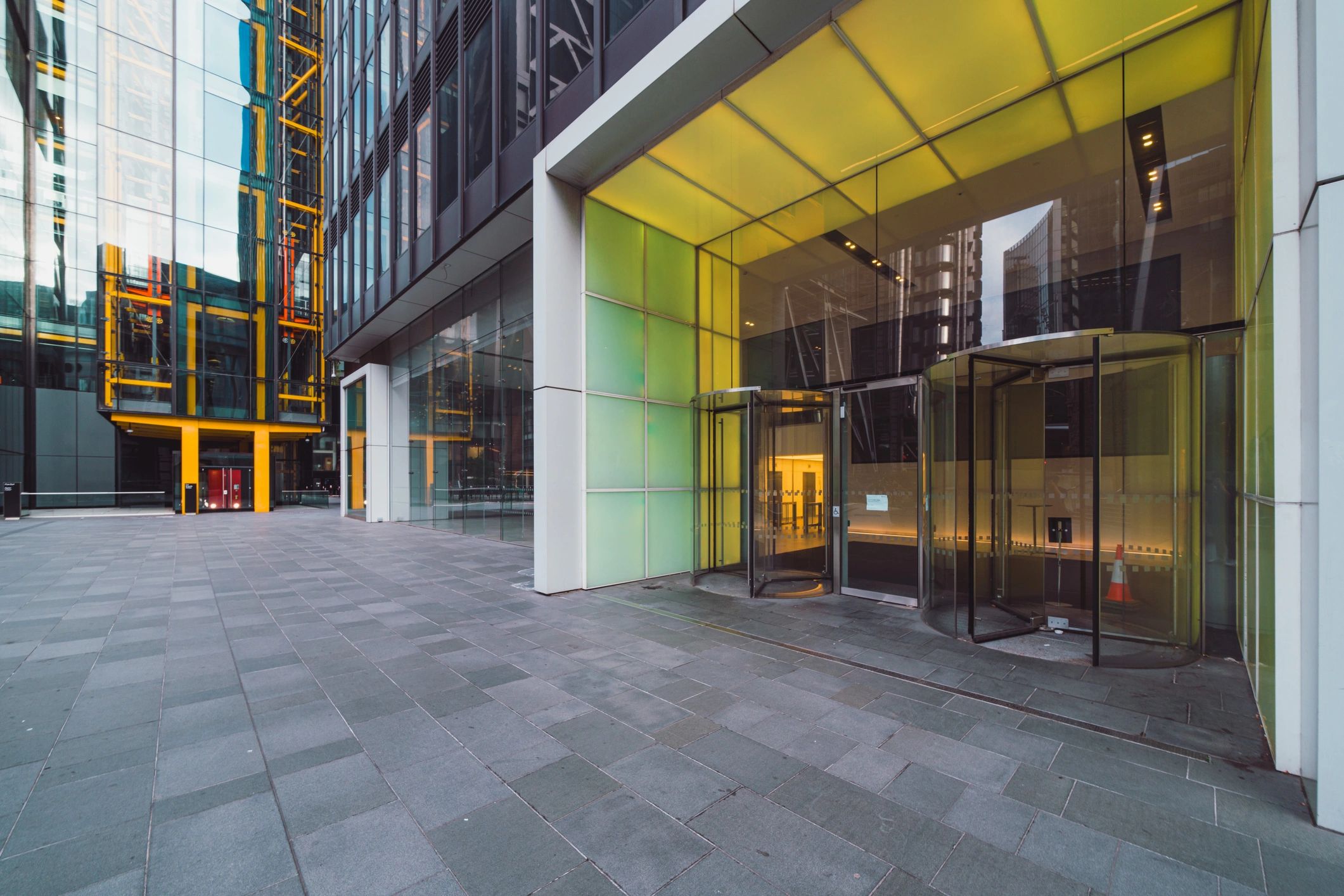 London modern office building entrance with revolving door